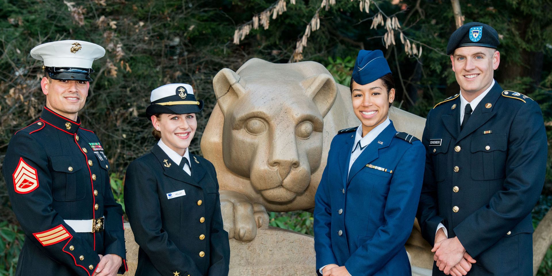 U.S. military members in front of Lion Shrine