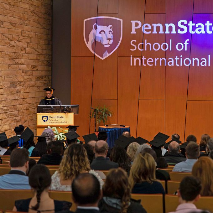 Interim Dean Victor Romero delivers remarks at the 2024 Graduate Recognition Ceremony.