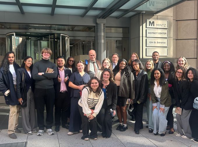 SIA students and Grant Littke outside the Kroll office building in Washington, D.C.