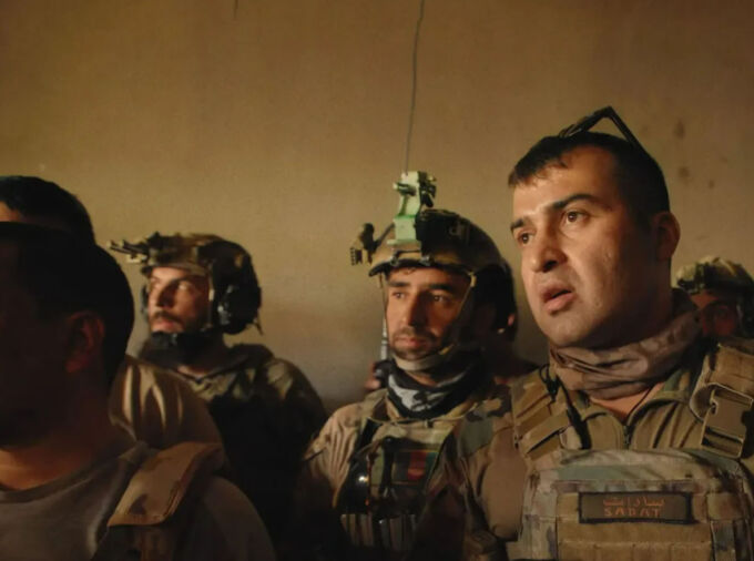 Still image from the documentary "Retrograde" showing soldiers in uniform