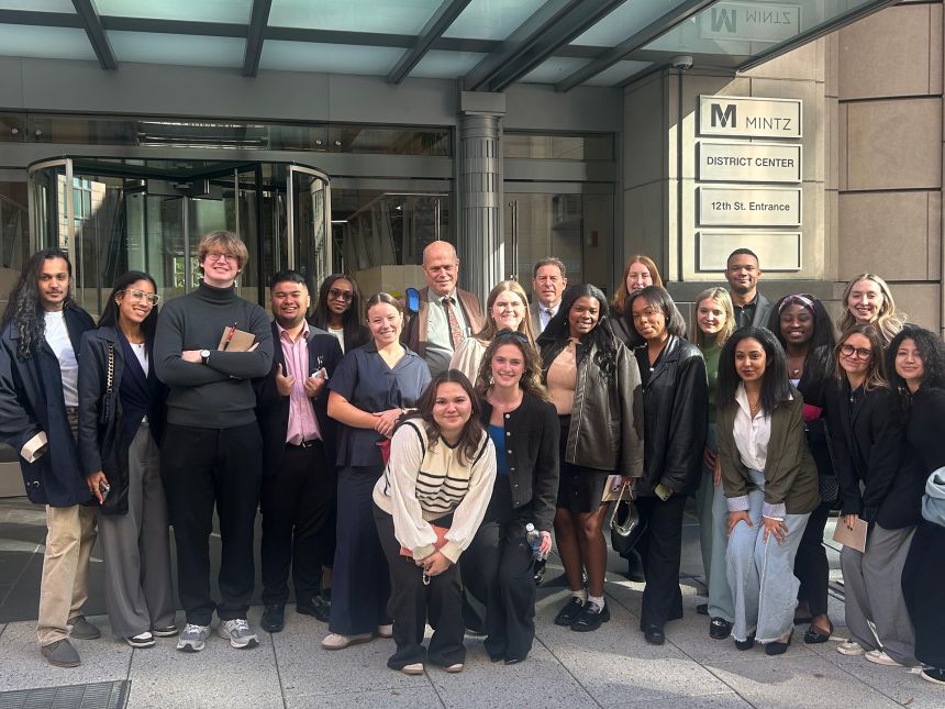 SIA students and Grant Littke outside the Kroll office building in Washington, D.C.